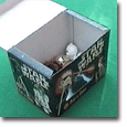 Caja conteniendo ''Port-A-Chup''